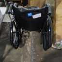 Medline Lightweight Wheelchair for Adults With Swing-Back Desk-Length Arms, Swing Away Leg Rests, 300 lb Capacity, 18" Seat