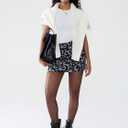 EXLURA Women's Leopard Print Mini Skirt High Waist Sexy Cheetah Skirts Trendy Pencil Bodycon Short Skirts Concert Outfit 2025 (L)