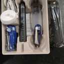 Oral-B Rechargeable Electric Toothbrush, iO5 Limited Deep Clean & Whiten, 5 Cleaning Modes, Visual Pressure Sensor to Protect Gums, Travel Case, 3 Brush Heads, Black