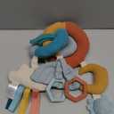 Itzy Ritzy Spiral Car Seat & Stroller Activity Toy - Stroller & Car Seat Toys for Ages 0 Months and Up - Hanging Toys Include Clinking Rings, Mirror and Textured Ribbons (Rainbow)