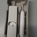 Oral-B Rechargeable Electric Toothbrush, iO2 Starter Kit, 3 Cleaning Modes, Automatic Pressure Sensor to Protect Gums, 2 Brush Heads, Pure White 