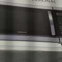 Farberware 1.1 Cu. Ft. Countertop Microwave Oven  1000 Watts Power, Auto Cook Settings, Defrost, Easy Clean and Child Safety Lock - Stainless