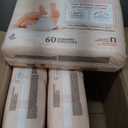 Huggies Size Newborn Diapers, Skin Essentials Baby Diapers, Size Newborn (6-9 lbs), 180 Count (3 Packs of 60), Packaging May Vary