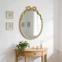 Oval Wall Mirror with Gold Finish, Iron Frame with Decorative Bow Design, Elegant Vintage Style