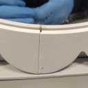 White sun-shaped mirror