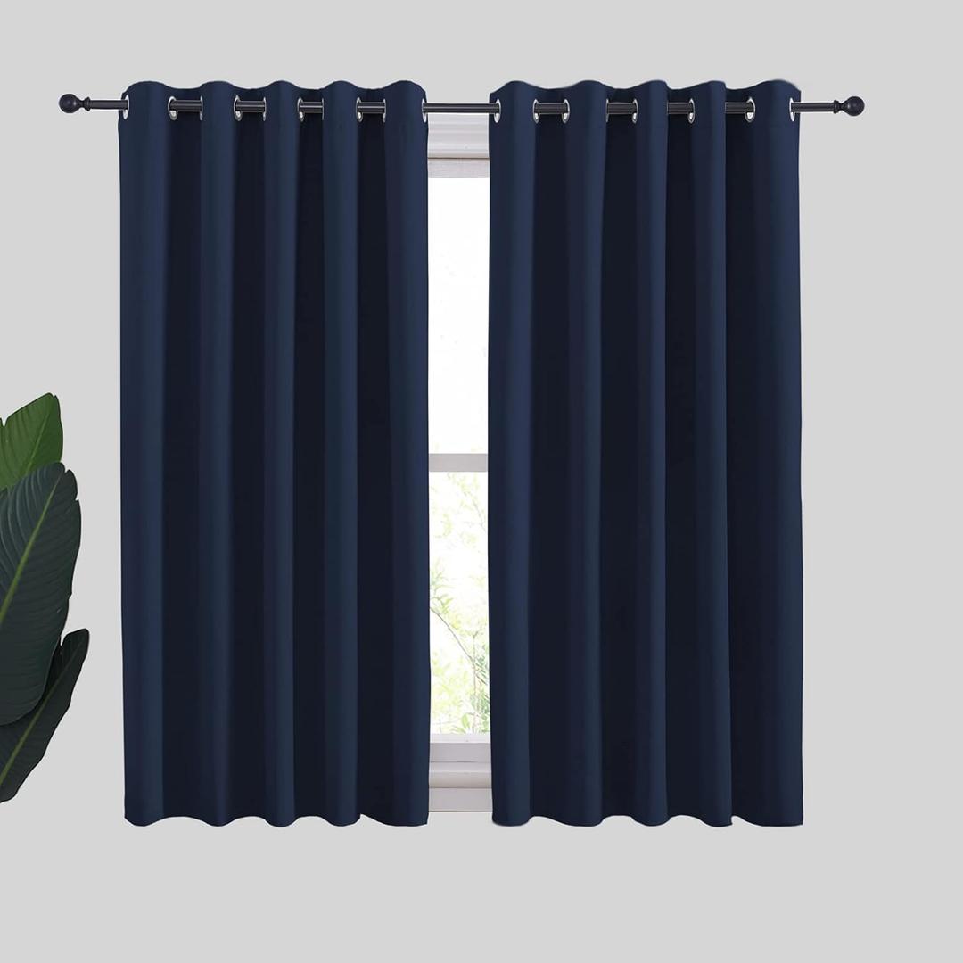 NICETOWN Blackout Draperies Curtains, All Season Thermal Insulated Solid Grommet Top Blackout Curtains/Drapes for Kid's Room (Navy, 1 Pair, 70 x 54 inches)