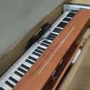 88 Key Weighted Keyboard Piano with Sustain Pedal, Power Adapter & Sheet Music Stand - Home Digital Piano, Brown (Keyboard Only), 51 inches x 10.6 inches x 3.5 inches