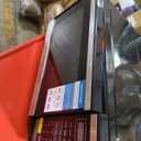 Farberware 1.1 Cu. Ft. Countertop Microwave Oven  1000 Watts Power, Auto Cook Settings, Defrost, Easy Clean and Child Safety Lock - Stainless and Black