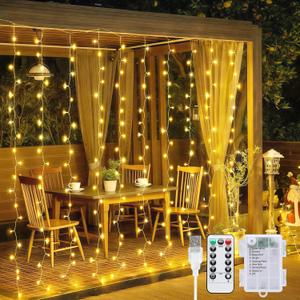 JMEXSUSS 200 LED Christmas Curtain Lights Battery Operated & USB Plug in, 8 Modes Warm White Curtain String Lights for Backdrop Bedroom Classroom Wedding Party Decorations