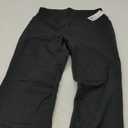 Jockey Women's Premium Pocket Slim Flare Yoga Pants (Medium, Deep Black)