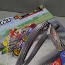 Hot Wheels Mario Kart Circuit Track Set & 2 Toy Vehicles, Racing Playset Includes Booster, Plus Mario & Yoshi Karts, Large