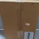 Amazon Basics Hard-Sided Dog and Cat Kennel, Single-Door Travel Pet Carrier with Metal Wire Ventilation, 23.6"L x 15.7"W x 13"H, Beige
