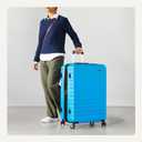 Amazon Basics 30" Hardside Large Checked Luggage, Expandable For Up to 15% More Space, With Scratch-Resistant Surface, Four Multi-directional Wheels, Telescoping Handle, Light Blue