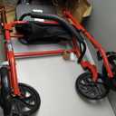 Drive Medical Rollator Walker with Seat - Stable Mobility Support - Height Adjustable - Durable Steel Frame Construction - Smooth 7.5" Wheels - Foldable Frame - 350 Lb Limit - Red