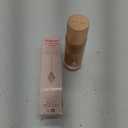 Charlotte Tilbury Hollywood FlawlessFilter - MultiUse Makeup Primer, Complexion Booster & Illuminating Liquid Highlighter with Sheer Coverage - Smooths & Blurs Skin (2.5 Fair - Golden beige shade for light skin tones)