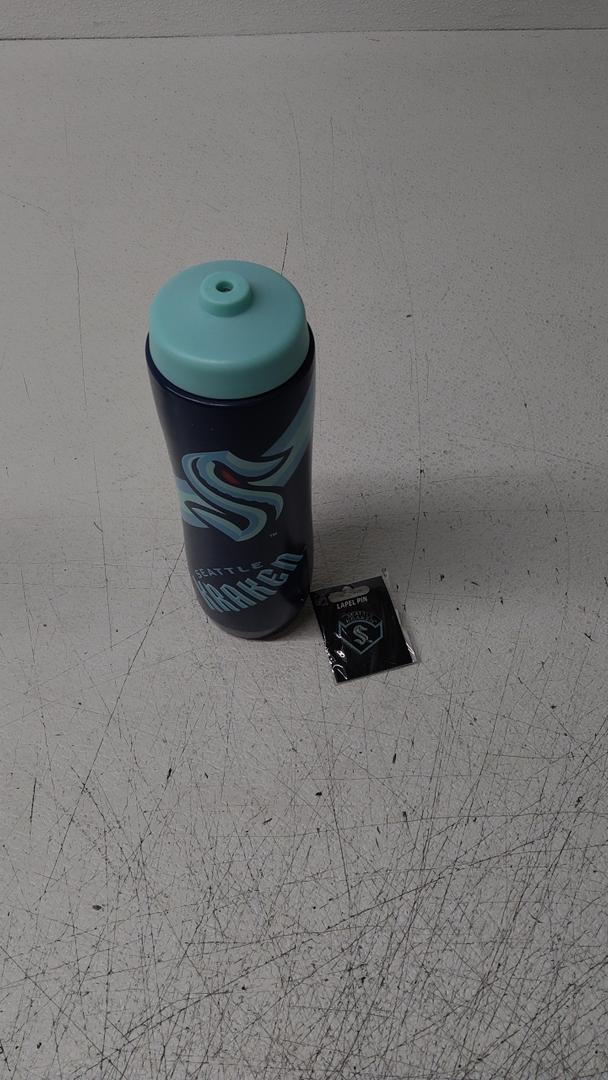 Party Animal NHL Seattle Kraken Squeezy Water Bottle
And Lapel Pin