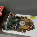 MOMENTS IN TIME Christmas Village Cuckoo Clock Animated Santa & Tree Scene with LED Lights and Music Plug-in Adapter Holiday Tabletop Decoration (17.5H)