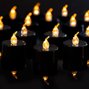 LANKER 24 Pack Black Tea Lights Candles, Flickering Warm Yellow Flameless LED Tealights, Long Lasting Battery Operated Fake Candles, Decoration for Wedding, Halloween and Christmas