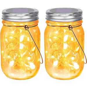 SteadyDoggie Solar Mason Jar Lights - Set of 2 Magical Patio Lights in Glass Lanterns - Hang Them Anywhere Outdoors for Enchanting Illumination - Waterproof and Decorative - 5.2" x 3"