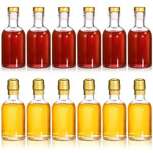 Hacaroa 12 Pack Small Glass Liquor Bottles with T-Top Caps and Heat Shrink Capsules, 3 Oz (100ml) Clear Nordic Vodka Bottles, Boston Travel Shots Bottles for Wine, Alcohol, Whiskey, Beverages Hacaroa 12 Pack Small Glass Liquor Bottles with T-Top Caps and Heat Shrink Capsules, 3 Oz (100ml) Clear Nordic Vodka Bottles, Boston Travel Shots Bottles for Wine, Alcohol, Whiskey, Beverages