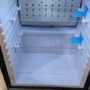 Smeg FAB5 16" 50's Retro Style Series Compact Cooler with 1.5 cu. ft. Capacity Automatic Defrost LED Interior Lighting and Adjustable Shelves Right Hand Hinge Made in Italy (Black)