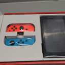 Nintendo Switch with Neon Blue and Neon Red Joy-Con - Handheld Gaming Console (Black)