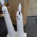 DRomance Halloween Ghost Flameless Taper Candles Flickering Battery Operated with Remote and Timer 3D Wick White Real Wax LED Taper Candles Halloween Dinner Decoration Indoor(2 Pack, 0.79"D x 9.5"H)