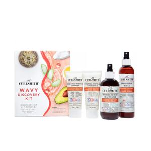 The Curlsmith Wavy Discovery Kit is a curated four-step hair care system specifically designed for Type 2 wavy hair. It focuses on providing lightweight hydration and definition without weighing hair down or leaving a "crunchy" residue.