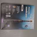 Philips Sonicare 7300 Series Electric Toothbrush - Next-Generation Sonicare Technology, Pressure Sensor, 12 Brushing Settings, SmarTimer, BrushPacer, 21-Day Runtime, Travel Case, Black, HX7421/07