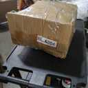 nflatable arch with snowman soldiers on both ends and a polar bear, blue snowflake, and cute Santa penguin in the middle of the archway