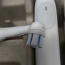 Oral-B Rechargeable Electric Toothbrush, iO Limited Simple Clean, 3 Cleaning Modes, Automatic Pressure Sensor to Protect Gums, Travel Case, White (1 Count (Pack of 1))