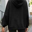Fisoew Women's Hoodies Oversized Sweatshirts Casual Long Sleeve Side Slit Pullover Tops Fall Winter Outfits with Pocket (Black, XL)