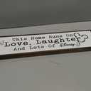 WKYAER Home Sign Decor, Rustic Table Decor, Farmhouse Wall Decoration for Homes Front Door Porch Entryway, Housewarming Gift for Disney Lover, This Home Runs On Love, Laughter and Lots of Disney Sign, 17.8x4x1.2 inches