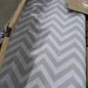 Amazon Basics Full-Size Ironing Board - 4-Leg Fold-Up, Chevron Removable Cover, 60"L x 14"W x 38"H