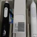 Oral-B Pro 1000 CrossAction Electric Toothbrush, Black and White, 2 Count