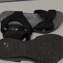 Clarks Women's Arla Shore Flat Sandal, Black Textile, 6.5 Medium US