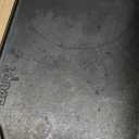 Lodge Reversible Cast Iron Grill/Griddle  9.5 x 16.75 Inch Pre-Seasoned Cooking Surface  Flat & Ribbed Sides  Use on Stove, Grill, or Campfire  Made in the USA  Heavy-Duty, Black