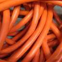 Amazon Basics 100 foot 3-Prong Vinyl Indoor/Outdoor Extension Cord - 10 Amps, 1250 Watts, 125 VAC - Orange