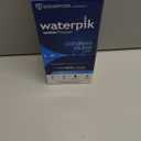 Waterpik Cordless Pulse Rechargeable Portable Water Flosser for Teeth, Gums, Braces Care and Travel with 2 Flossing Tips, Waterproof for Shower, ADA Accepted, WF-20 White