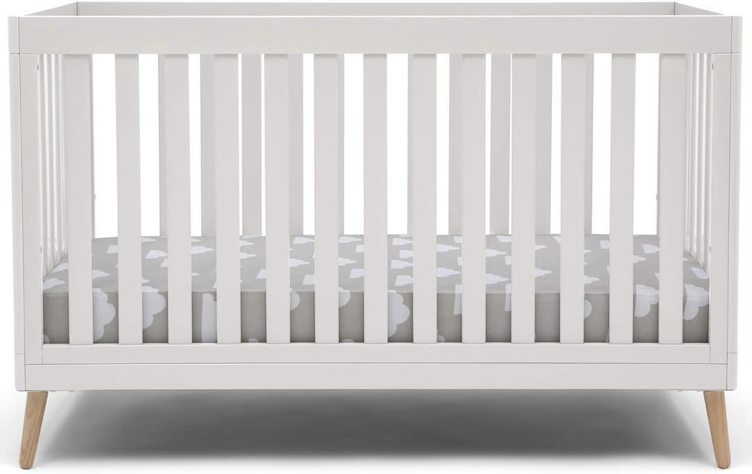 Delta Children Essex 4-in-1 Convertible Baby Crib, Bianca White with Natural Legs