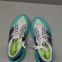 New Balance Women's FuelCell Rebel V4 Shoes (7 Wide, Cyber Jade/Black/White)