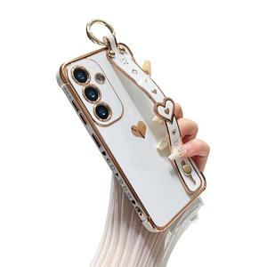 DEFBSC Compatible with Samsung Galaxy S24 Plus/S25 Plus Case, Electroplated Edge Love Heart Case with Wrist Strap, Full Camera Protection Raised Reinforced Corners Shockproof Soft TPU Cover, White