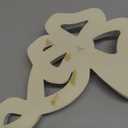 Ekena Millwork 11"W x 15 3/4"H x 1 1/8"P Versailles Large Ribbon with Bow Onlay, Left