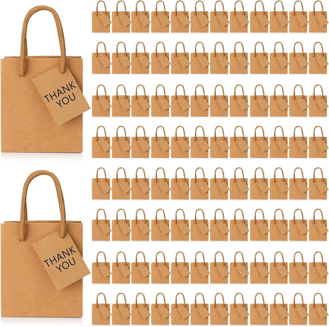 Sherr 100 Pcs Mini Gift Bags Bulk, 4 x 2.75 x 4.5 in Paper Bag with Tag, Extra Small Paper Gift Boxes with Handles for Birthday, Party Favor, Wedding, Small Business, Spring Easter(Brown)