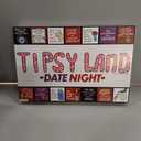 Tipsy Land Date Night Game - Your new favorite date night drinking game is here! Grab your date, roll the dice, and move around the board. Tipsy Land Date Night is packed with unique couples-themed spaces made for calling out your partner, stupid dar