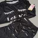 WDIRARA Women's Cute Cartoon Print Closed Eyes Print Tee and Shorts Pajama Set Black M