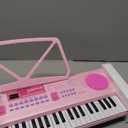 WOSTOO Kids Keyboard Piano, Portable 61 Keys Keyboard Electronic Digital Piano, Early Learning Educational Musical Piano Toy Keyboard for Beginners with Music Stand, Microphone (Pink)