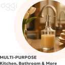 OGGI 10oz Round Glass Soap Dispenser with Satin Silver Pump  Elegant Refillable Oggi Soap Dispenser for Bathroom, Kitchen Sink, or Hand Sanitizer  Rust-Resistant Dispenser Pump for Daily Use (Clear)