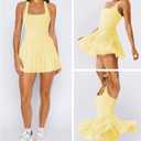 Hragc Women's Tennis Flowy Pleated Ruffle Athletic Dress for Women Halter Neck Sleeveless Mini Golf Dress with Shorts Pocket (Yellow, S)
