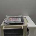 Nuwave Bravo Air Fryer Toaster Smart Oven, 10-in-1 Countertop Convection, 1800 Watts, 21-Qt Capacity, 50-450F Temp Controls, Top and Bottom Heater Adjustments 0%-100%, PFAS Free, Cream